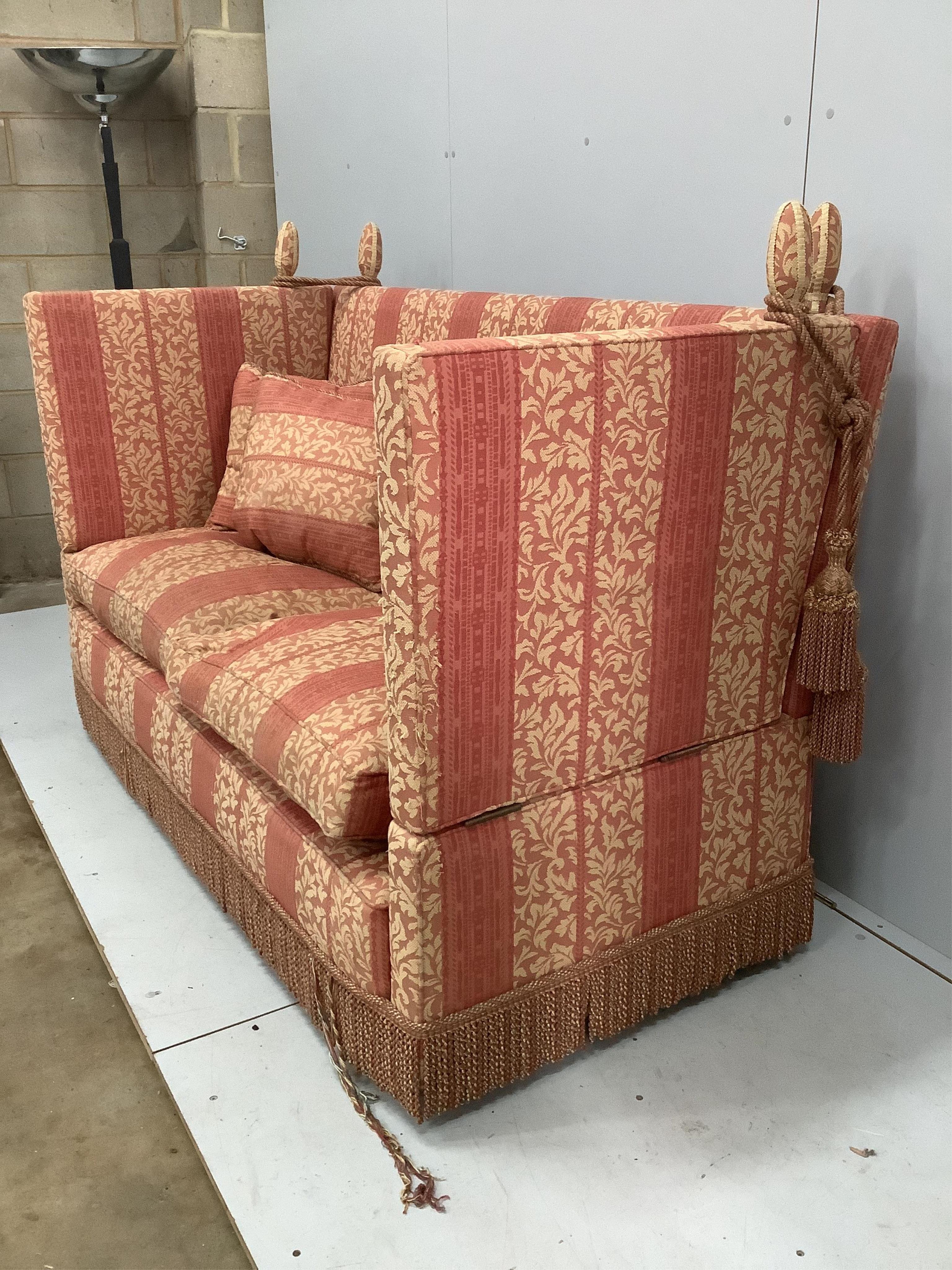 A Knole two seater settee, width 178cm, depth 84cm, height 118cm. Condition - fair